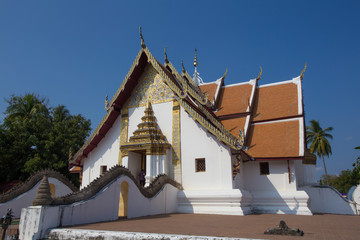 Fototapeta na wymiar The white main hall of Phumin Temple in Nan province, Thailand