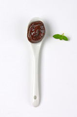 spoon of plum jam