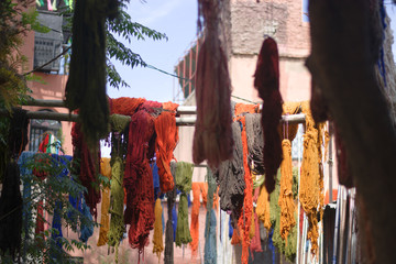 Fototapeta na wymiar The bright colors of wool in the Eastern markets