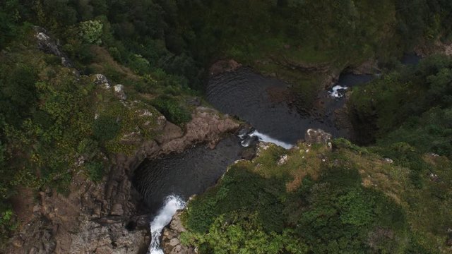 Orbiting a two-tiered plunging waterfall on Molokai. Shot in 2010.