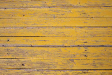 Old yellow wood plank wall texture background