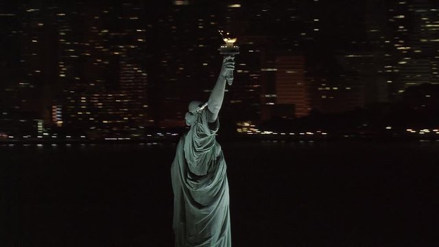 Flying around Statue of Liberty at night