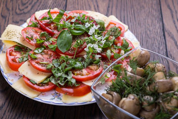 Vegetarian salad with cheese and tomatoes