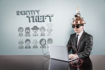 Idendity theft concept with vintage businessman and laptop
