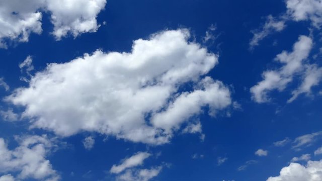 Blue sky and white clouds. Timelapse