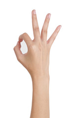 Obraz premium Woman's hand gesturing sign ok (okay) back side, Isolated on white background.