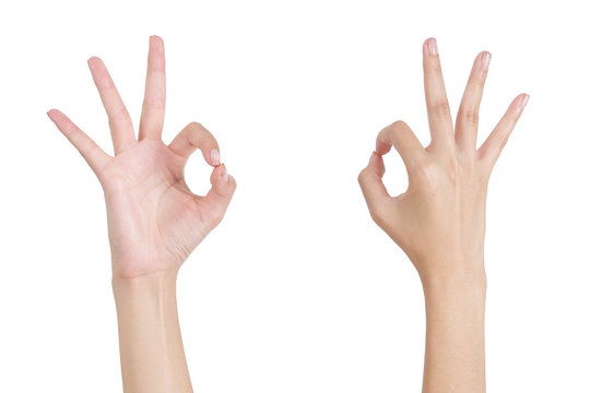 Woman's hands gesturing sign ok (okay) front and back side, Isolated on white background.