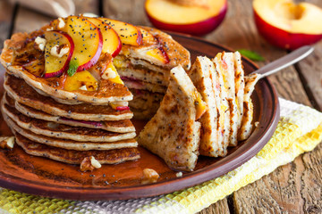Pancake with poppy seeds and peaches