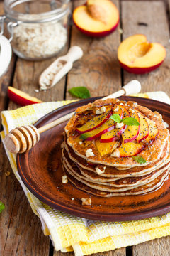 Pancake with poppy seeds and peaches