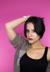 Beautiful girl on a pink background