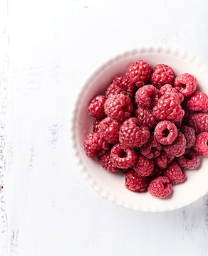 Fresh organic raspberries in a bowl

