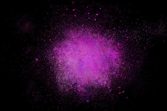Colourful abstract powder explosion on a black background