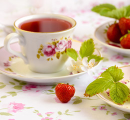 Fruits tea served with strawberry
