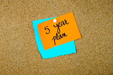 Five Year Plan written on paper notes