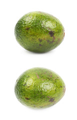Spotted ripe avocado fruit isolated