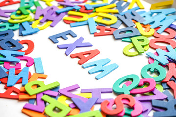 colorful wooden letter with white background