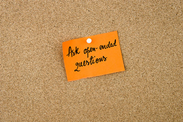 Ask Open-Ended Questions written on orange paper note