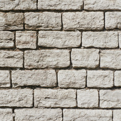 Fragment of an old brick wall