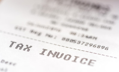 Fototapeta premium Tax invoice receipt with macro view