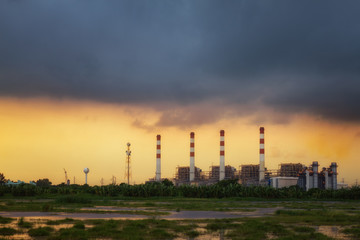 Fototapeta na wymiar power station at sunset