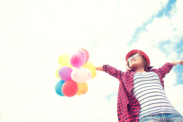 Fototapeta na wymiar young beautiful woman holding balloon very happy on the fresh ai
