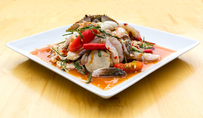 Green Papaya Salad (Som tum Thai) mixed with seafood and mushroo