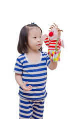 Little asian girl playing with puppet over white