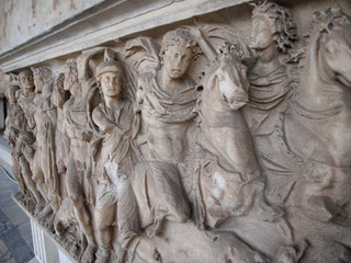 high relief of horseman on tombstone in Pisa