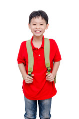 Young Asian schoolboy with backpack over white