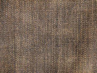 Texture of black jeans textile close up