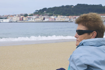Fototapeta na wymiar woman senior on the beach