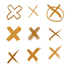 Set of vector hand-drawn cross, doodle gold illustration on white background