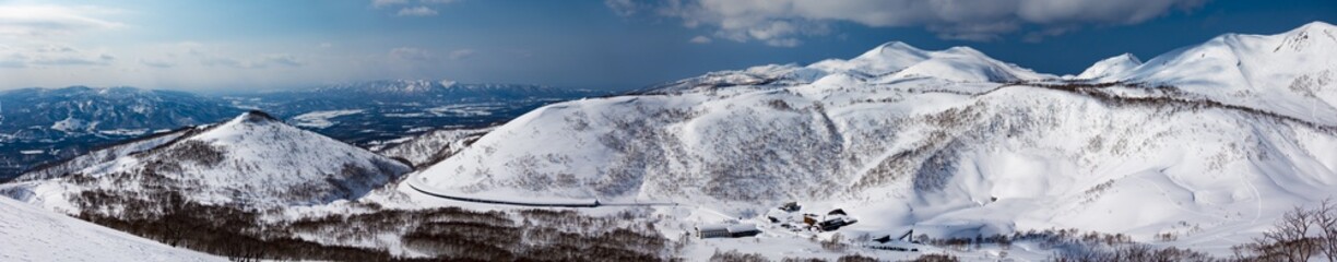 Niseko, Hokkaido, Japan Snowy Mountain Range Road Town Panorama - obrazy, fototapety, plakaty