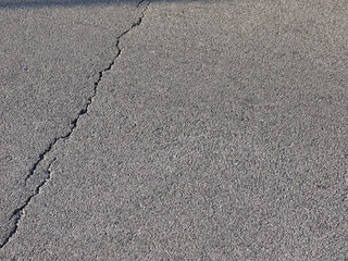 cracked asphalt road texture