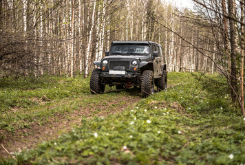 Fototapeta na wymiar off-road extreme expedition on black jeep wrangler
