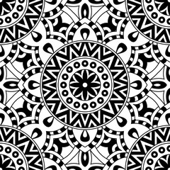 Mandala texture in bright colors. Seamless pattern on indian style. Abstract vector background