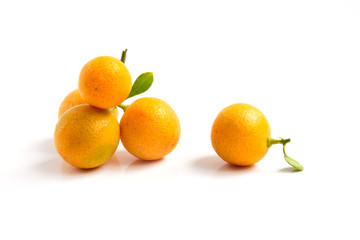Orange Kumquat placed on white background