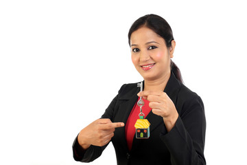 Business woman holding house key