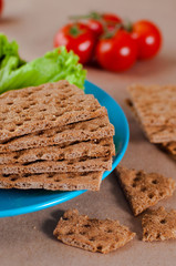 Close up of crispbreads with vegetables