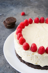 Cheesecake with Oreo cookies and raspberries