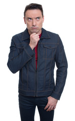 thoughtful handsome young man looking up