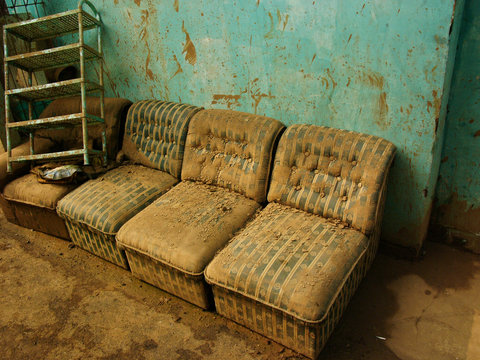 Jakarta, Indonesia - February 12, 2007: Flood-damaged chairs are left to dry outside a house after severe El Nino flooding hit the Indonesian capital city of Jakarta in Java, Indonesia.