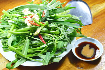 morning glory and sauce with iron flipper prepare to cook