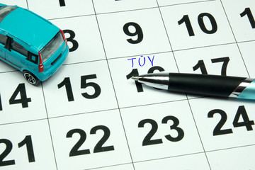 Ein Kalender mit einem Termin für eine TÜV Untersuchung