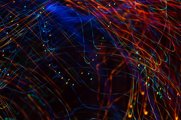 bright sparks on colorful background with bokeh effect