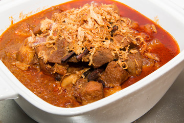 Beef  curry cooking in its spices