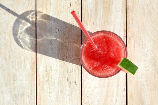 Healthy fresh smoothie drink from red watermelon and ice drift