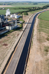 aerial view of the highway  and harvest fields