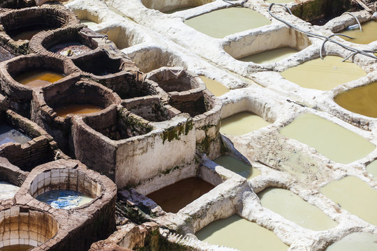 Workers at the Chouwara tannery in Fez, Morocco.