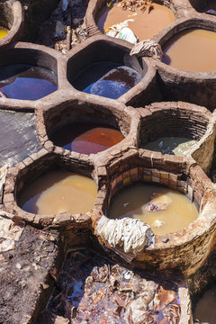 Workers at the Chouwara tannery in Fez, Morocco.